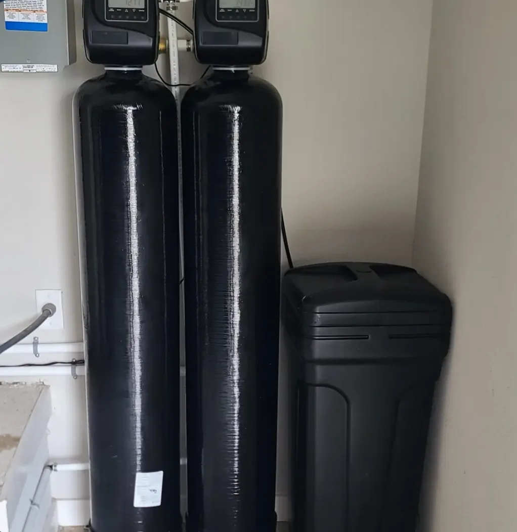 Whole-home water softener and carbon filtration system installed in a South Florida home